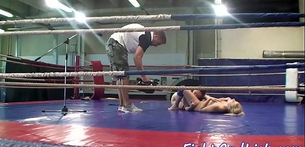  Asian lesbian rides strapon in a boxing ring